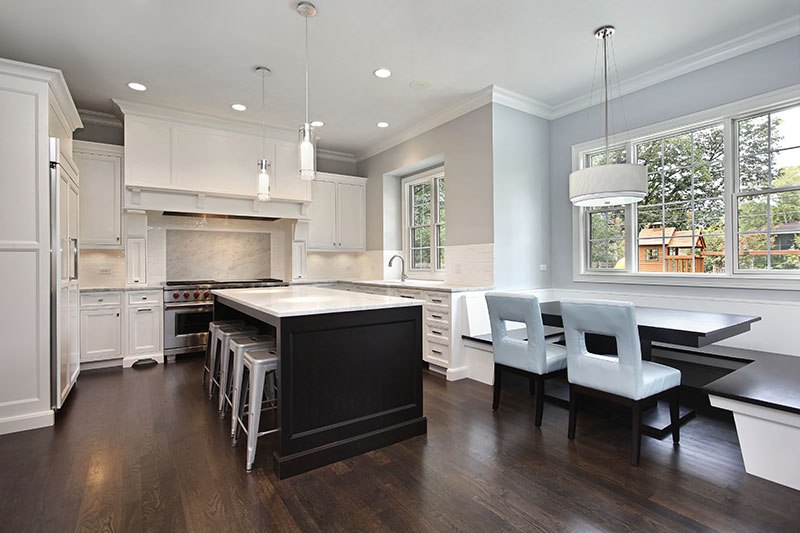 Shades Created Between Deep Natural Hardwood And Wall And Cabinets Gives A Subtle Hint Of Elegance